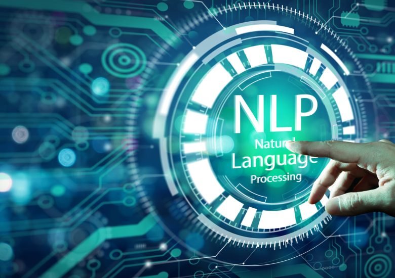 Businessman hand touching NLP hologram screen and technology background. Natural Language Processing cognitive computing technology concept.